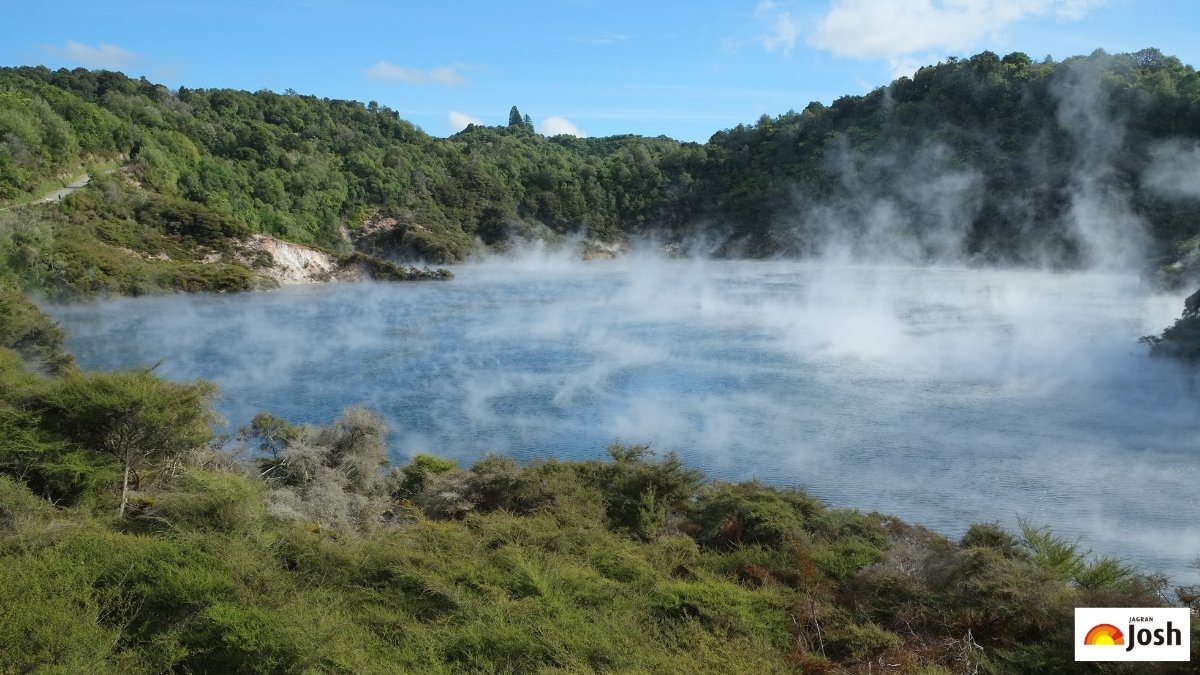 Frying Pan Lake geothermal hot spring in New Zealand surrounded by volcanic terrain
