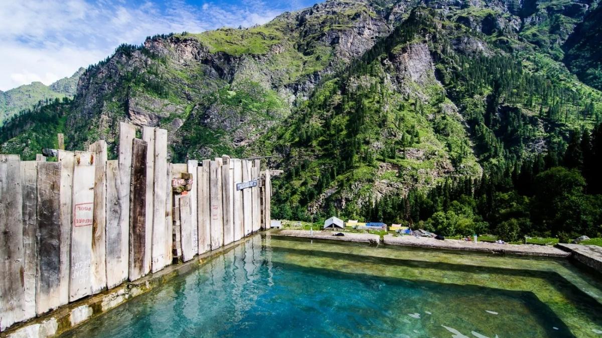 Khir Ganga Hot Springs in Himachal Pradesh amidst Himalayan peaks.