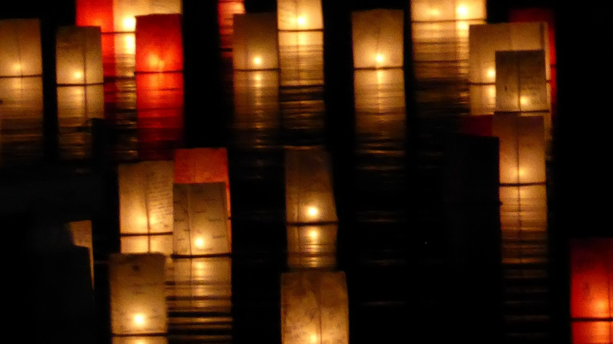During Obon, Japanese families honour their ancestors with dance, lanterns, and offerings at temples.