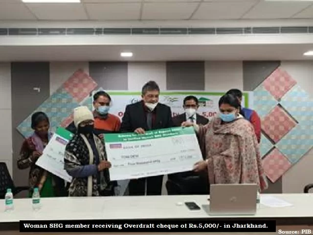 Woman SHG member receiving Overdraft cheque of Rs.5,000/- in Jharkhand, Source: PIB
