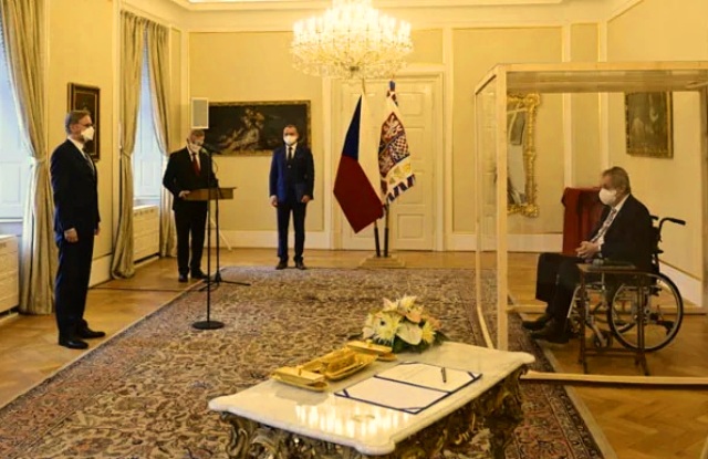 Czech President appoints Milos Zeman Petr Fiala as PM in ceremony behind glass 