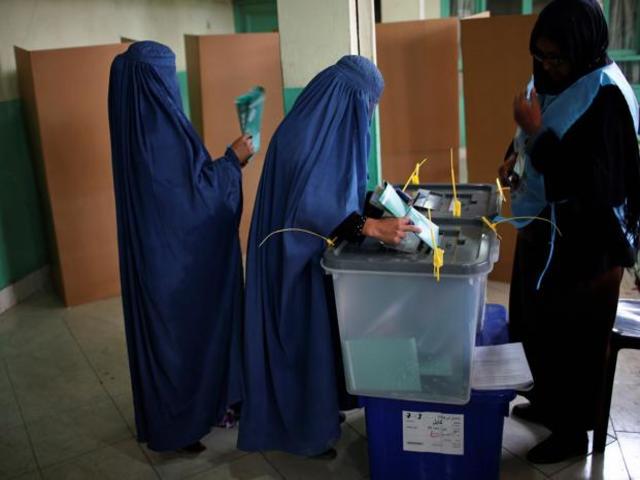 Afghan women voting in 2014, Source: Reuters