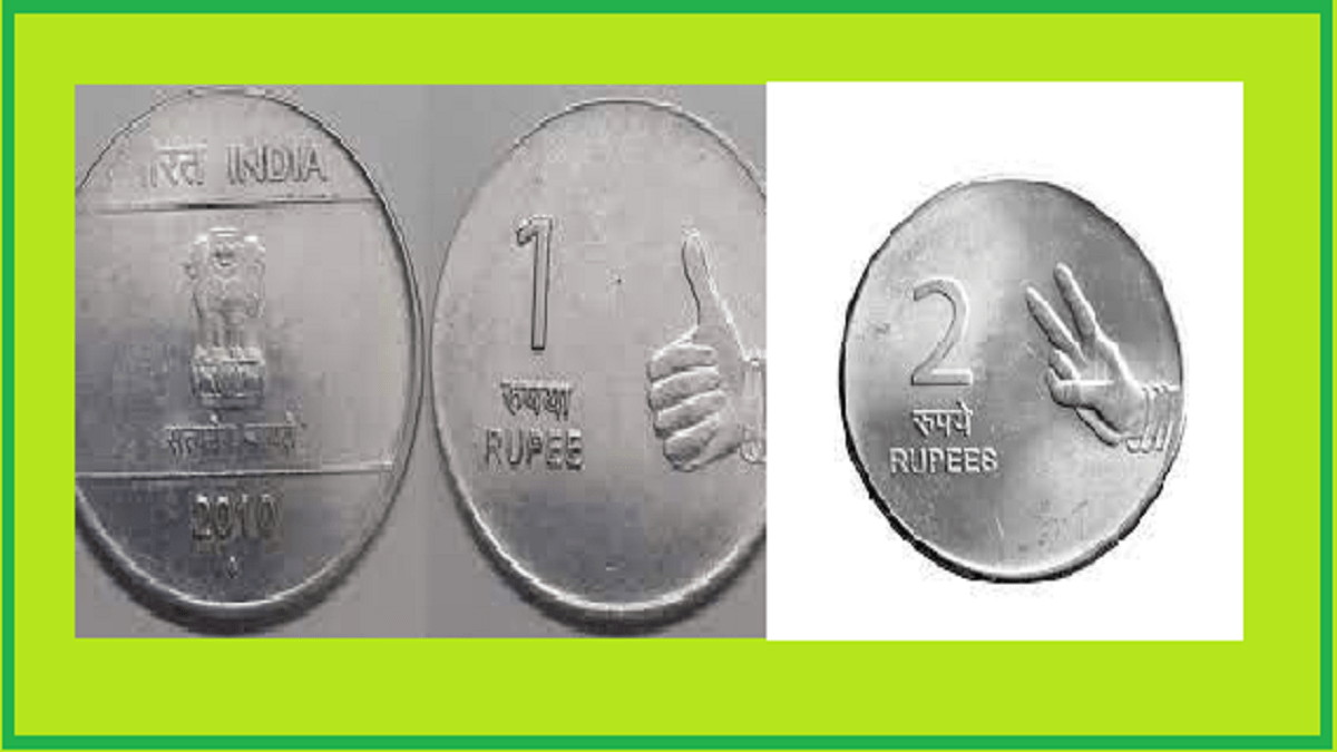 Meaning of thumb print on a coin