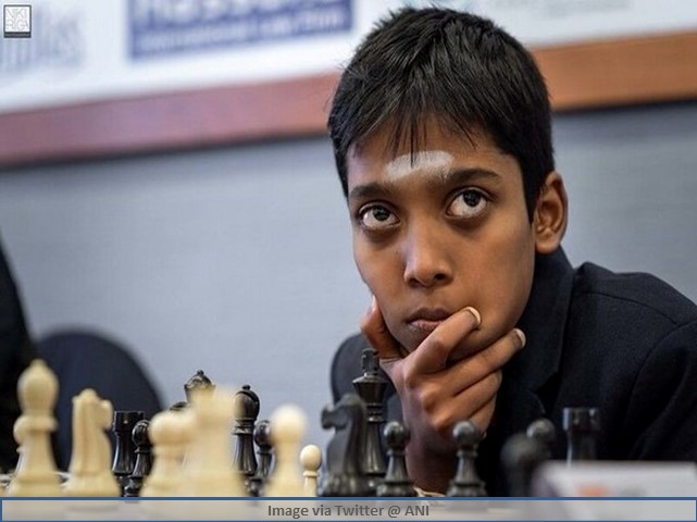 Rameshbabu Praggnanandhaa with Viswanathan Anand. Rameshbabu