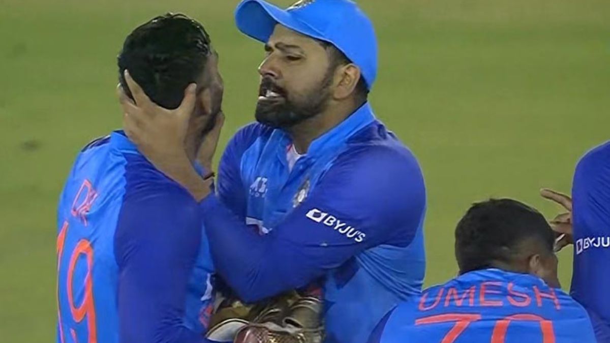 Rohit Sharma inappropriately grabbing Dinesh Karthik's neck