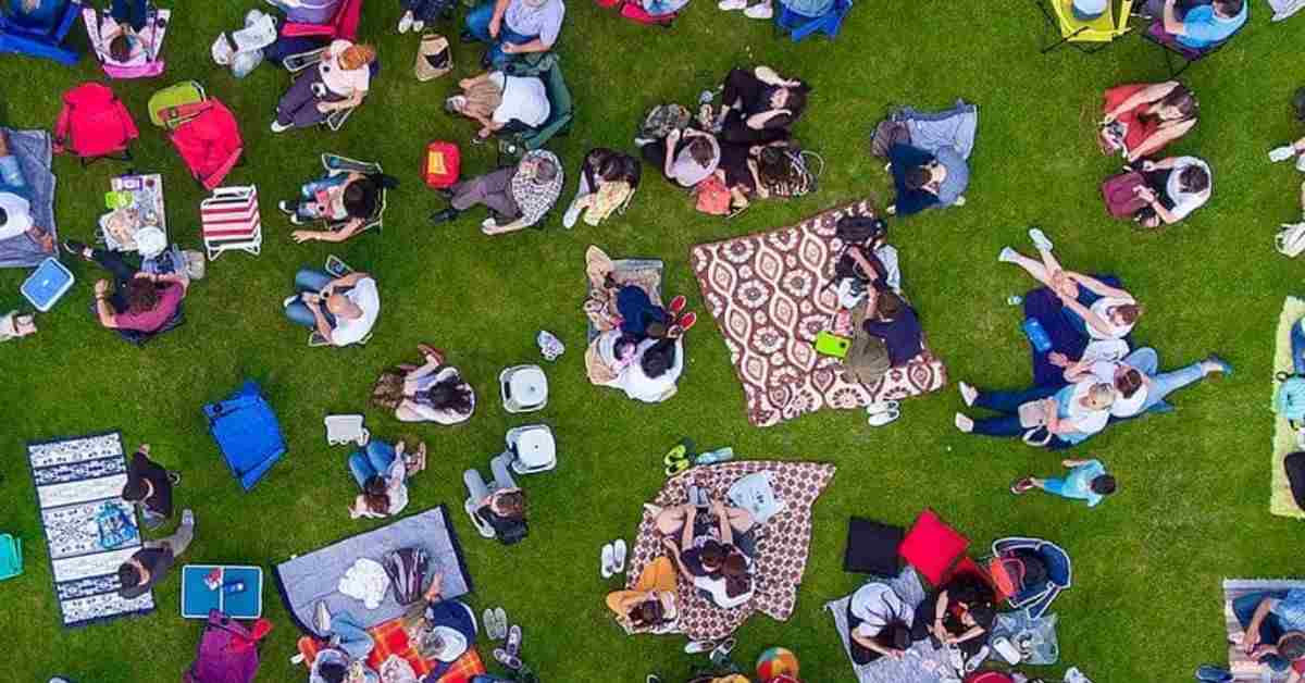 Optical Illusion Test: Can you find the Hidden Beach Ball among the people within 15 seconds?