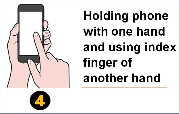 Holding phone with both hands and using both thumbs