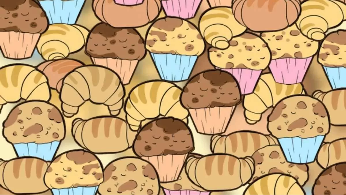 Find the cat hidden among cupcakes.