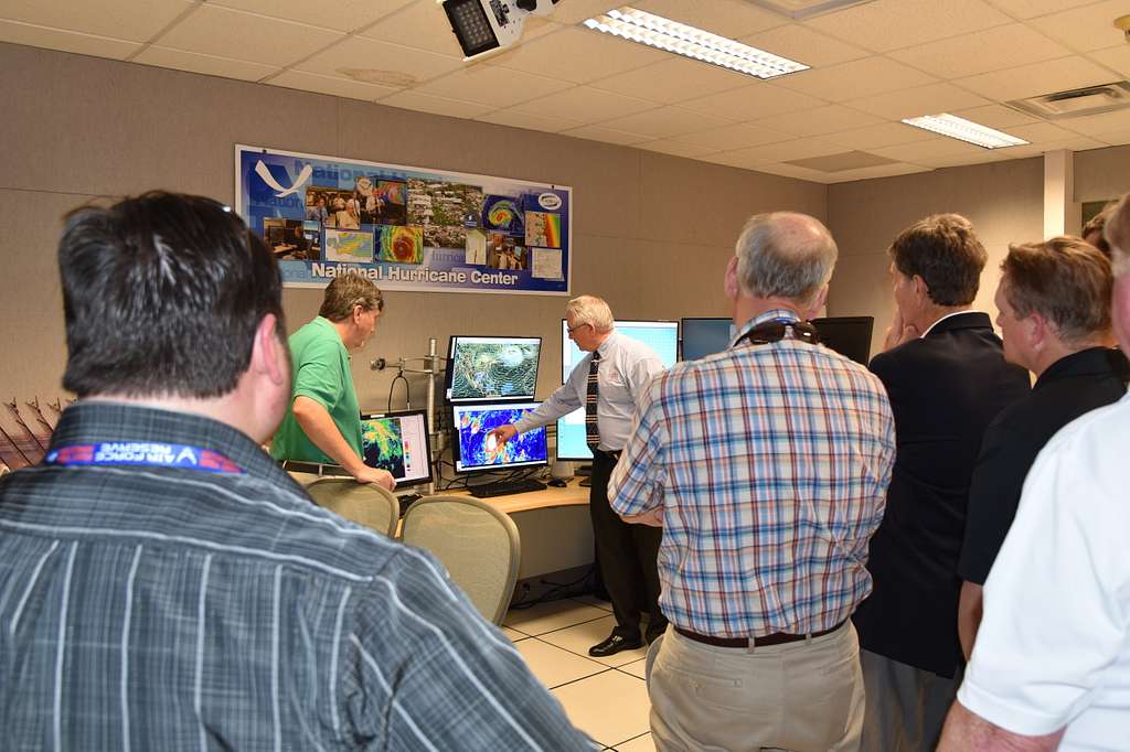 What is the National Hurricane Center monitoring in the Atlantic?