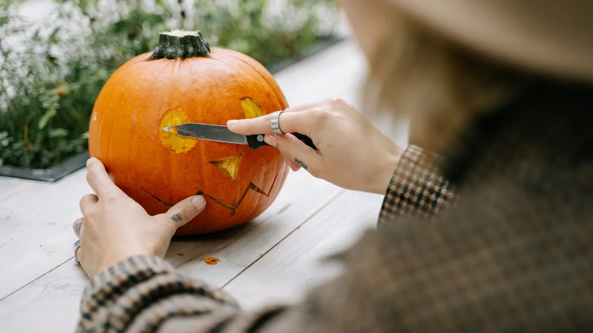 Carving pumpkins on Halloween