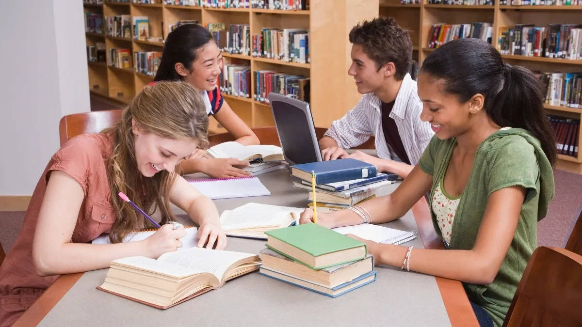International students studying in the library