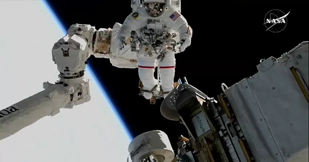 NASA astronaut Sunita Williams was securely fastened to the end of the Canadarm2 robotic arm as the International Space Station passed 260 miles above Earth's surface.