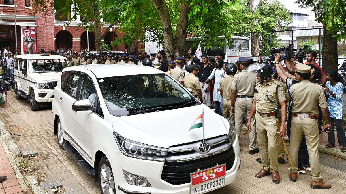 SFI activists protest against Higher Education Minister Roji M. John as a line of police personnel monitors the situation at Government Arts College, Thiruvananthapuram, following the 'One College One Innovation' event. Photo Credit: NIRMAL HARINDRAN