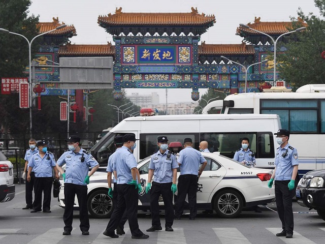China locks down areas in Beijing