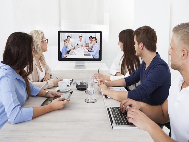 Employees attending meeting via Zoom App