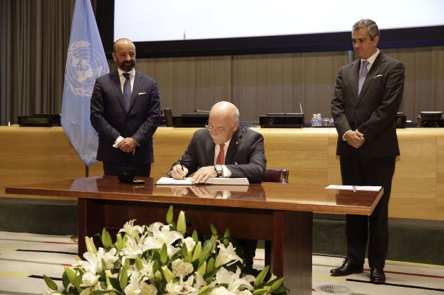Signing ceremony at UN Headquarters. Image Credit: UN Photo/Paulo Filgueiras